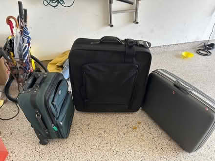 Photo of free Suitcases (Maple Lawn) #1