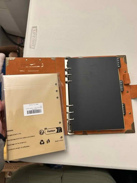 Photo of free small 6 ring binder (Campbell) #2