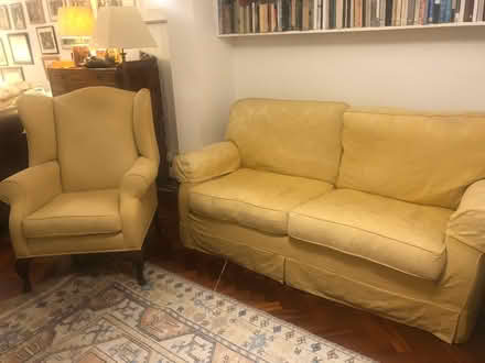 Photo of free Yellow/gold loose cover 3 seat sofa (South wonston SO21) #1