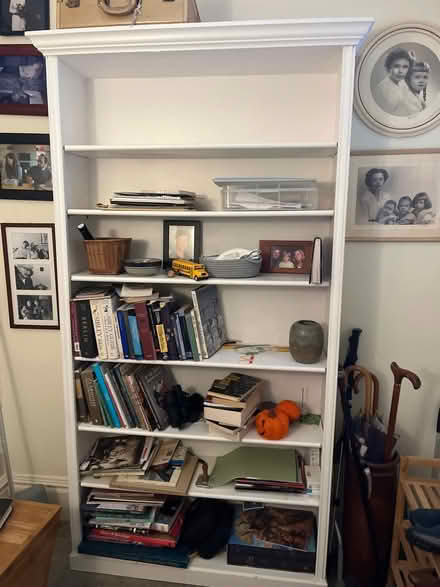Photo of free 7 foot tall wood bookcase (Greenlake) #1
