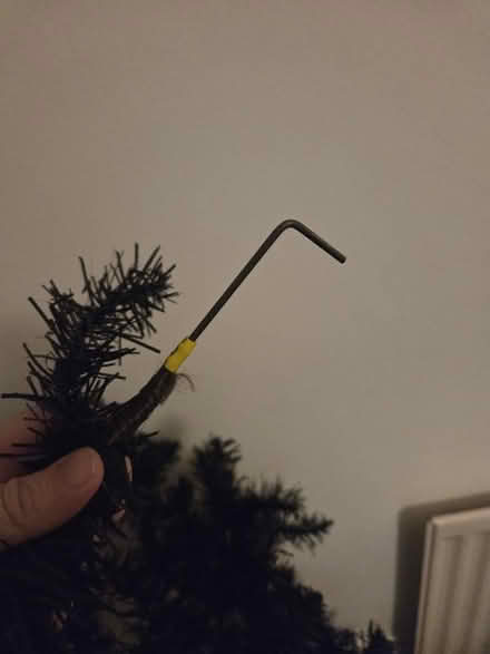 Photo of free Well loved black Christmas tree (TN34) #1