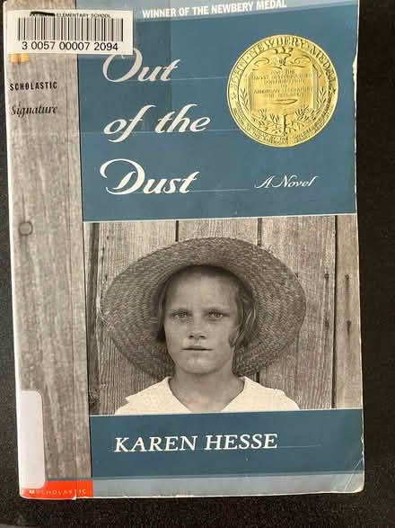 Photo of free Out of the Dust paperback (Crystal Beach) #1