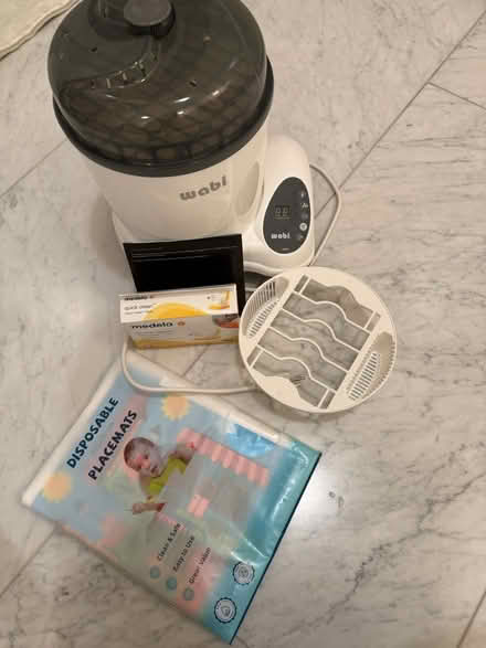 Photo of free baby bottle sterilizer & placemats (UES) #2