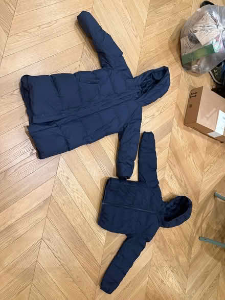 Photo of free 2 kids’ navy puffer coats (Chelsea Green SW3) #1