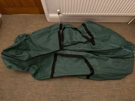 Photo of free Large artificial Christmas tree bag (Pooley Green TW20) #1