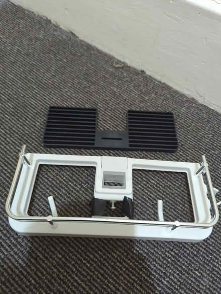 Photo of free Shower shelf -attaches to square/rectangle poles (Merton SW19) #2