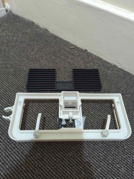 Photo of free Shower shelf -attaches to square/rectangle poles (Merton SW19) #1