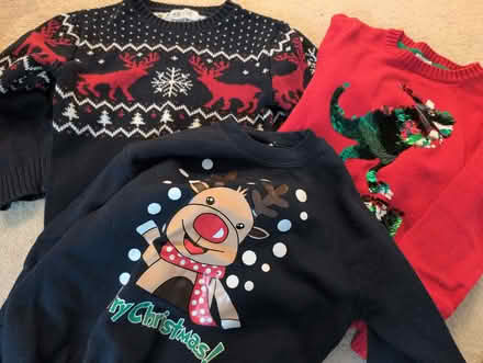 Photo of free Three Christmas jumpers age 6ish (Dogkennel Green RH5) #1