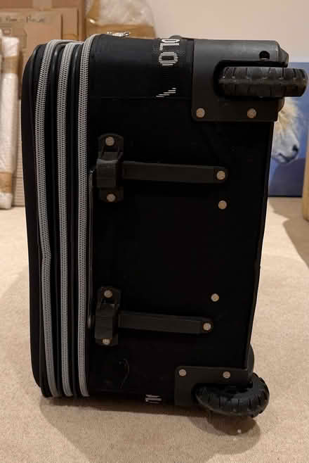Photo of free Large black suitcase (Glusburn) #4