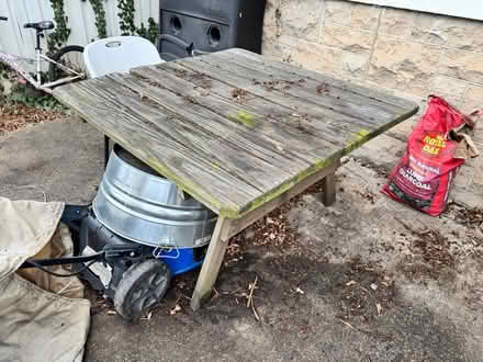 Photo of free Outdoor heavy wood table (Woodridge (20018)) #1