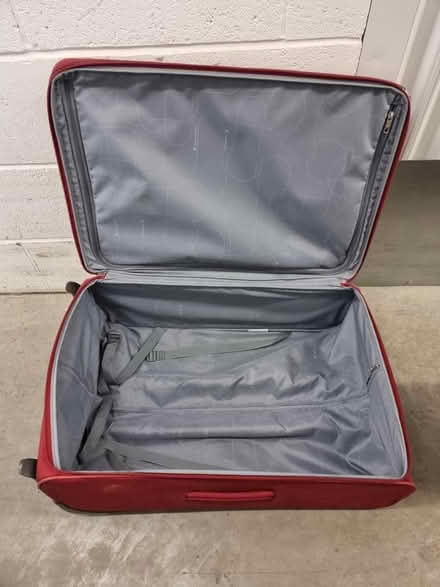 Photo of free Red Samsonite softshell suitcase (SW11 3SJ) #2