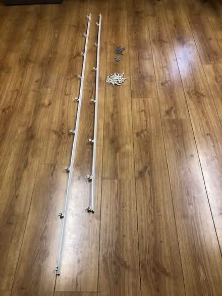 Photo of free 2 white plastic curtain rails (Delph OL3) #1