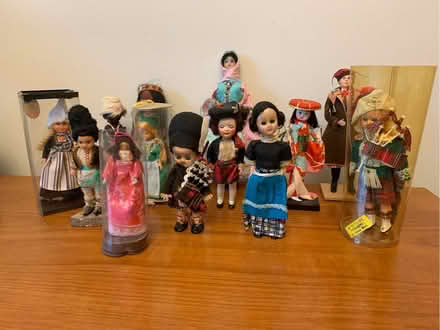 Photo of free 13 small dolls in costumes (Hazel Grove SK7) #1