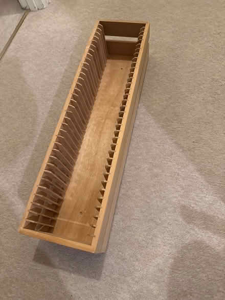 Photo of free Wooden cd rack (Moss Side PR25) #1