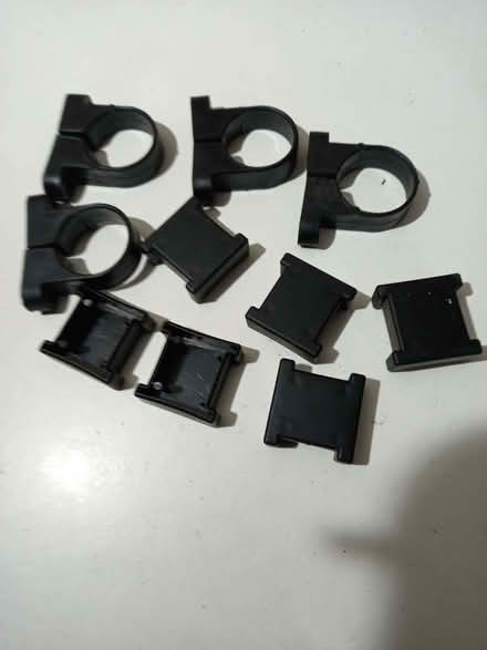Photo of free Plastic shelf clamps and end pieces (CT10) #1