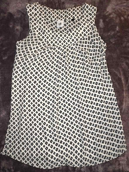 Photo of free Tank Top (Near 92nd and Sheridan) #1