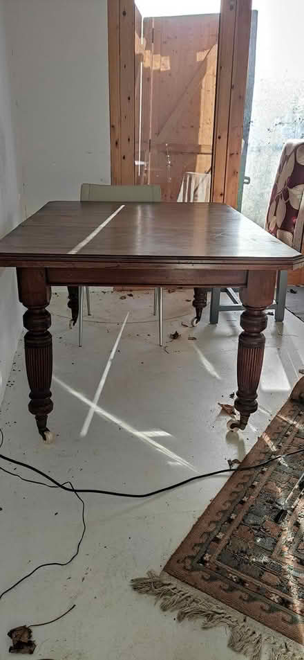Photo of free Large wooden table on wheels (Patcham) #2