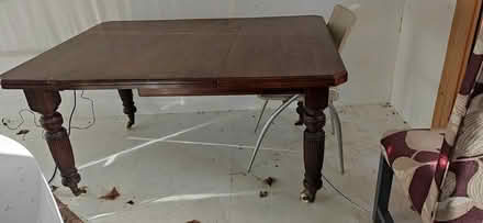 Photo of free Large wooden table on wheels (Patcham) #1