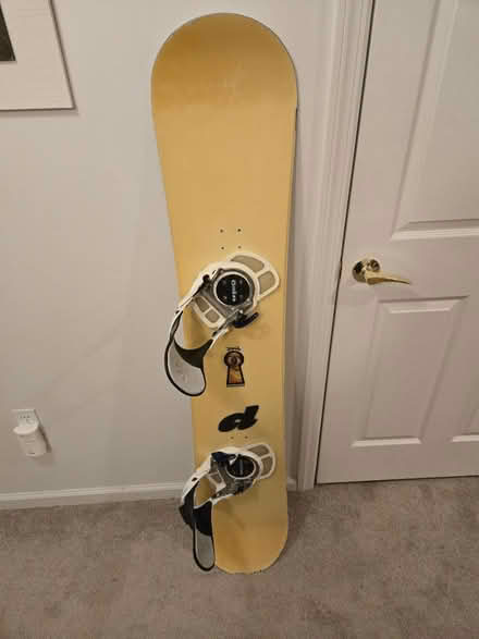 Photo of free Snowboard and step in bindings (Lawrence Township) #1