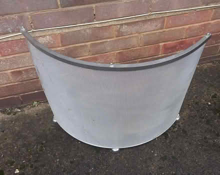 Photo of free Curved silver metal fire guard (Central Letchworth) #1