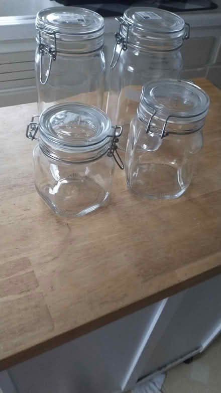 Photo of free 4 locking lid jars, medium to large (Montgomery) #1