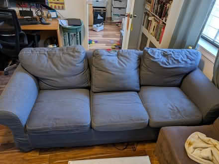 Photo of free Blue 3-4 Seater Couch (146th & Amsterdam Ave) #1