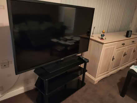 Photo of free TV and stand in good working order think it's a 52 inch (Hillmorton CV21) #3