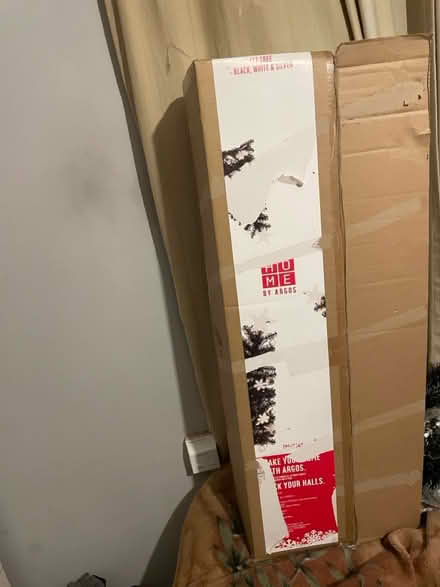 Photo of free 4 ft black Christmas tree (Deal) #1