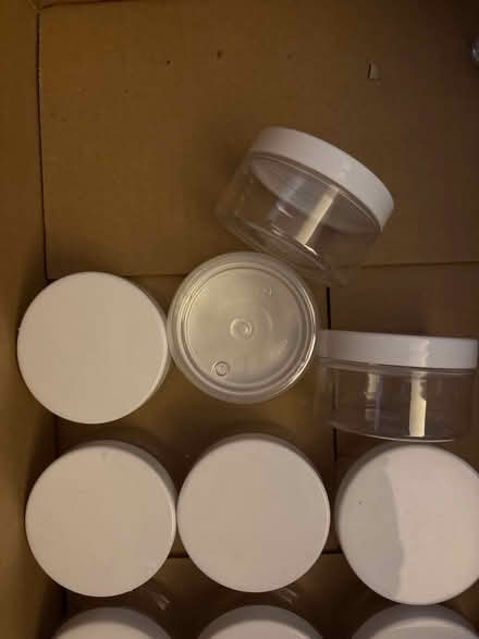 Photo of free 13 small plastic screw top jars (Limehouse E1) #2