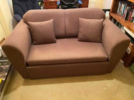 Photo of free Brown 2 seater sofa bed (Ashtead) #2