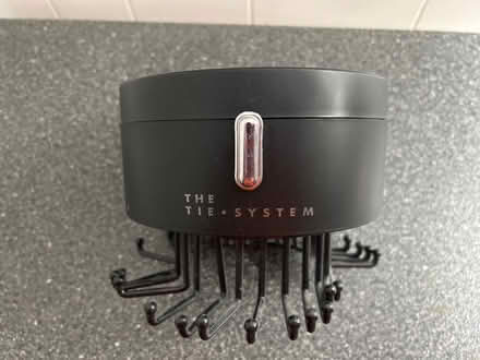 Photo of free Wall mounted revolving tie rack (Marley) #1