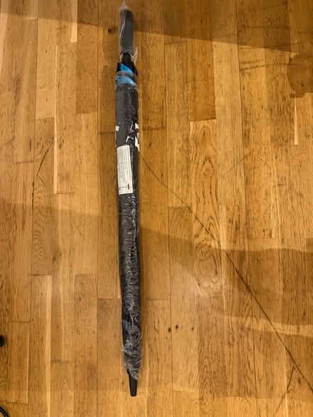 Photo of free Large company logo black golf umbrella (Canonbury N1) #1