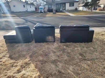 Photo of free Black Leather Couch (Tufts & Galapago) #2