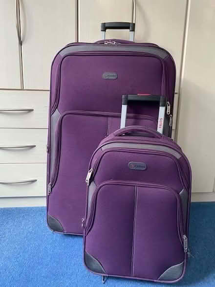Photo of free Set of 2 purple suitcases (GU14) #1