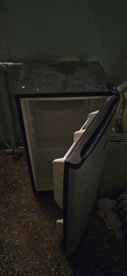 Photo of free Mini fridge (Eastside 22nd/Houghton) #1