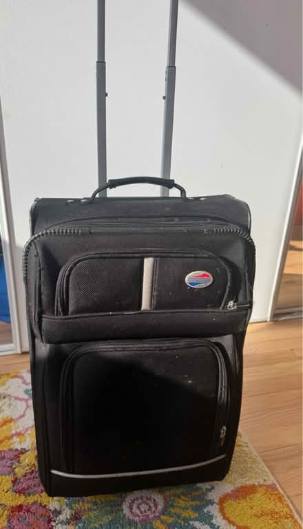 Photo of free black rolling suitcase (NE of Wrigley) #2