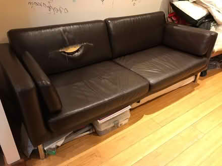 Photo of free Brown faux-leather sofa - damaged (SE16) #1