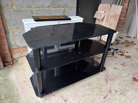 Photo of free Black glass tv stand (Cherry Hinton CB1) #1