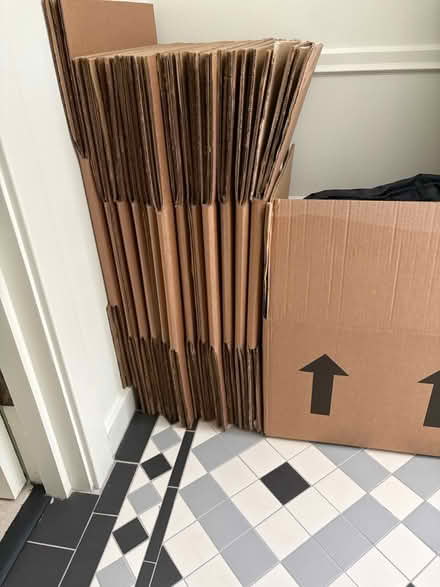 Photo of free Mixed sizes 18 x 18 moving boxes (Marryat Road SW19) #1