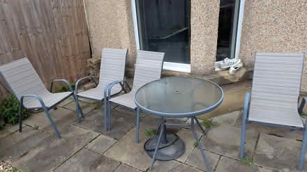 Photo of free outdoor table and four chairs (Sw17) #1