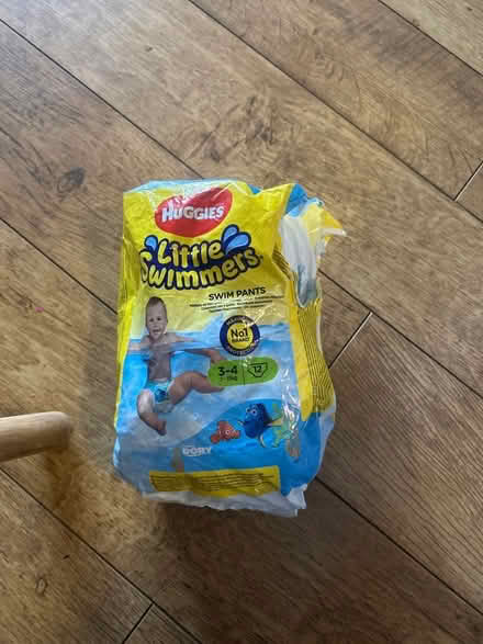 Photo of free Half pack of swim nappies and a bag of balls for Ball pit (Bedford MK41) #1