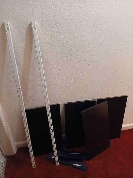 Photo of free Four black wooden shelves with brackets and runners (Blakenall WS3) #1