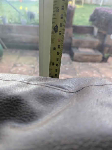 Photo of free Small brown leather sofa (CM7) #4