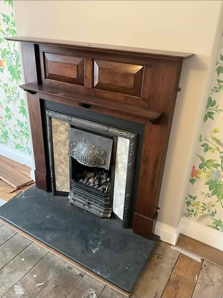 Photo of free Wooden/cast Iron Fire Surround (Minehead) #1