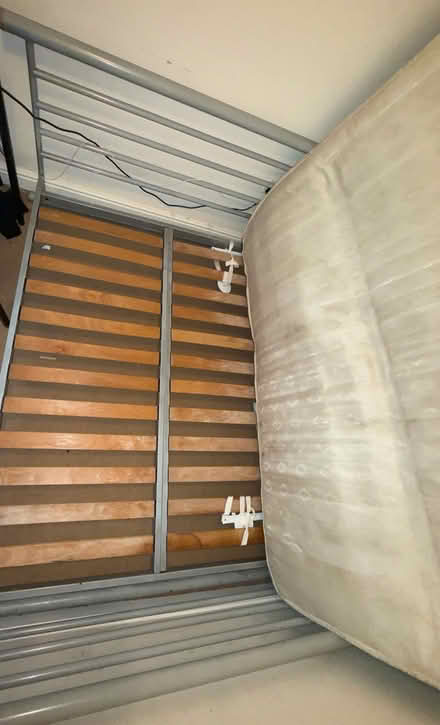 Photo of free Metal double Bed and old Mattress (Levenshulme M19) #4