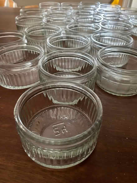 Photo of free 26 Matching glass Gü containers - Ideal as small candle hol (Eastbourne BN21) #1