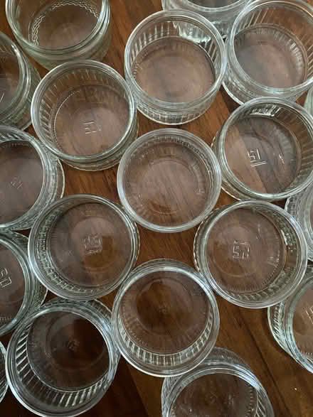 Photo of free 26 Matching glass Gü containers - Ideal as small candle hol (Eastbourne BN21) #2