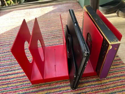 Photo of free red magazine/file/book rack (Wanstead E11) #1