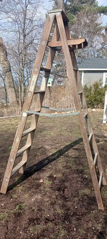 Photo of free Eight-foot wooden ladder (Melrose near Whole Foods) #1