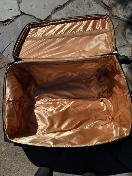 Photo of free Large black suitcase (Berkeley Hills near Kensington) #2